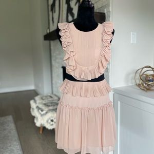BCBGMAX. Britt olear ruffle with back cut out. Rose cream color. Size 02
